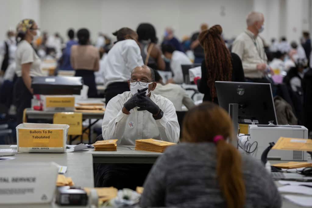 Michigan Election Workers Continue To Work Absentee Ballots