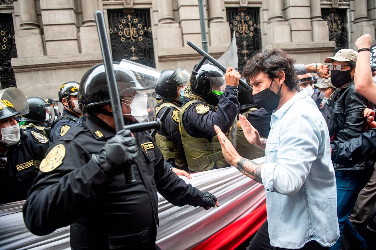 A supporter of ousted Peruvian President Martin Vizcarra