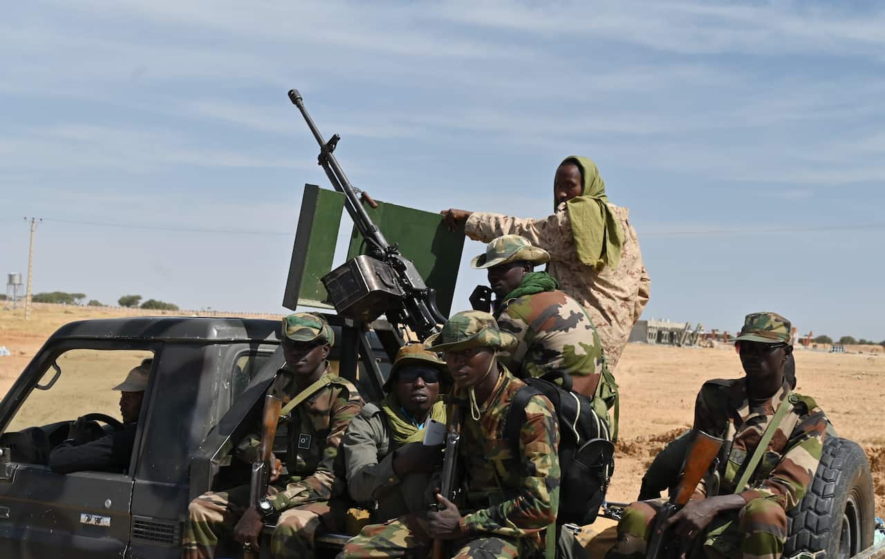 Nigerien soldiers patrol outside the Diffa airport in South-East Niger.
