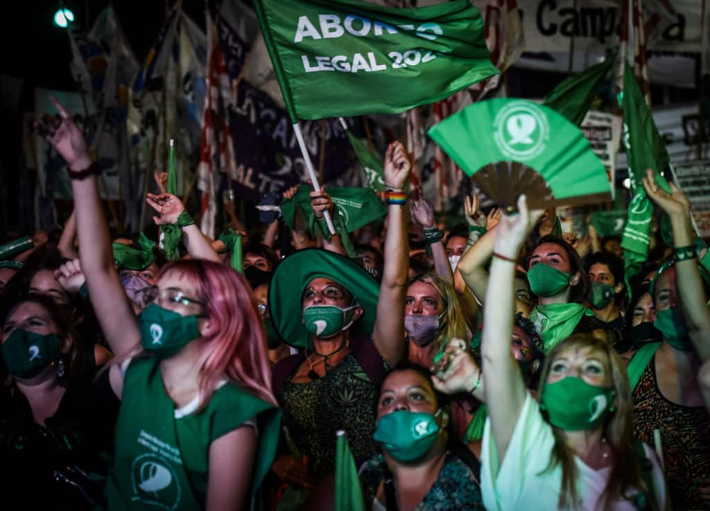 Pro-choice demonstrators celebrate after the right to an abortion is legalised in Argentina.