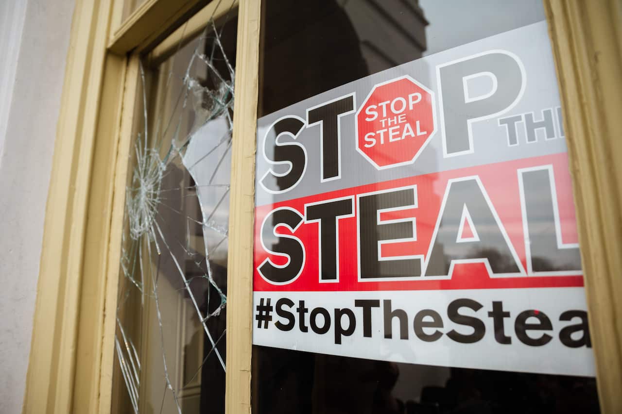 A Stop The Steal sign was posted inside of the Capitol Building after a pro-Trump mob broke into the building.