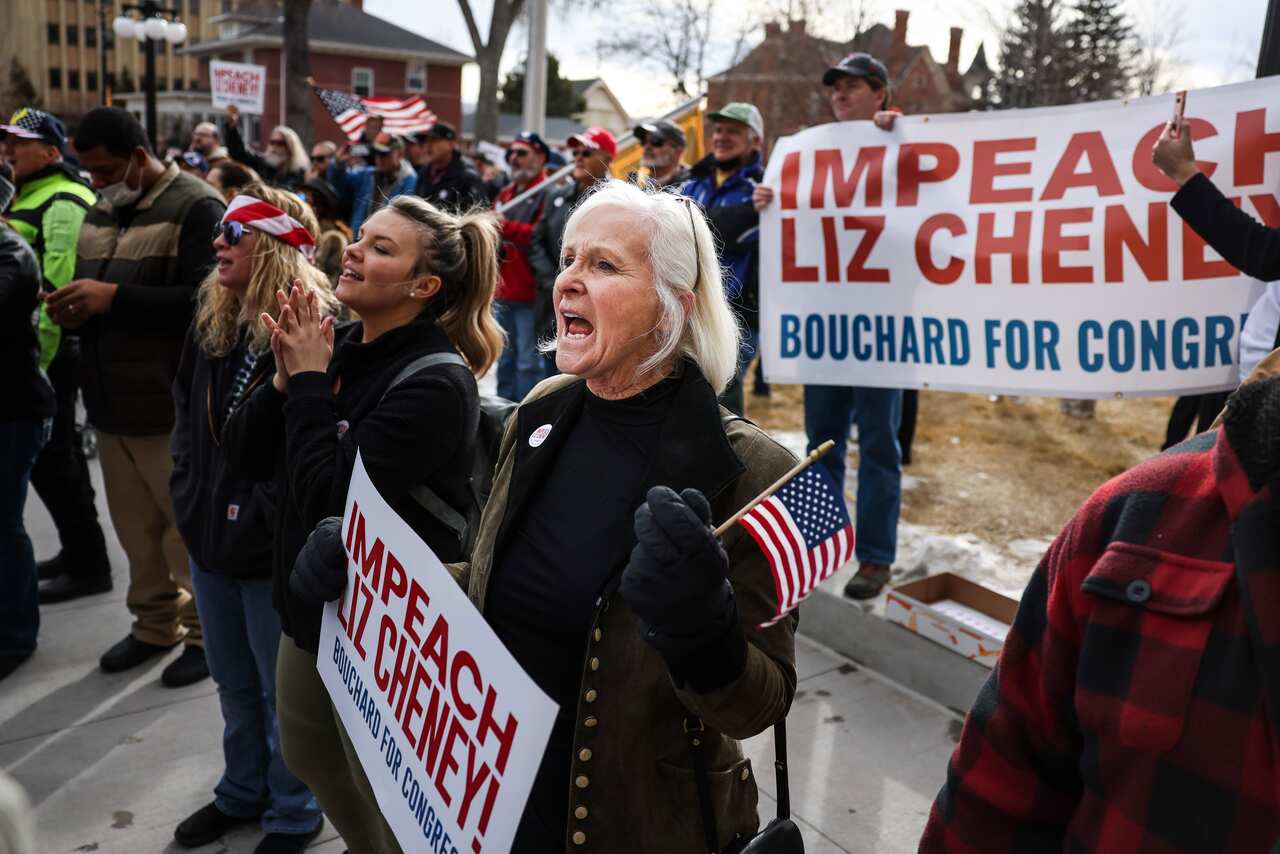 People cheer as Representative Matt Gaetz speaks during a rally against fellow Republican Liz Cheney in Wyoming on 28 January.
