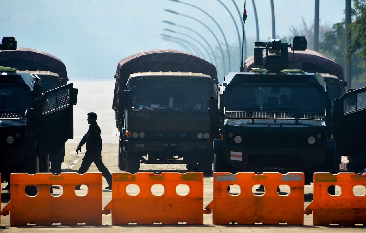 Soldiers stand guard along a blockaded road near Myanmar's parliament in Naypyidaw on 2 February.