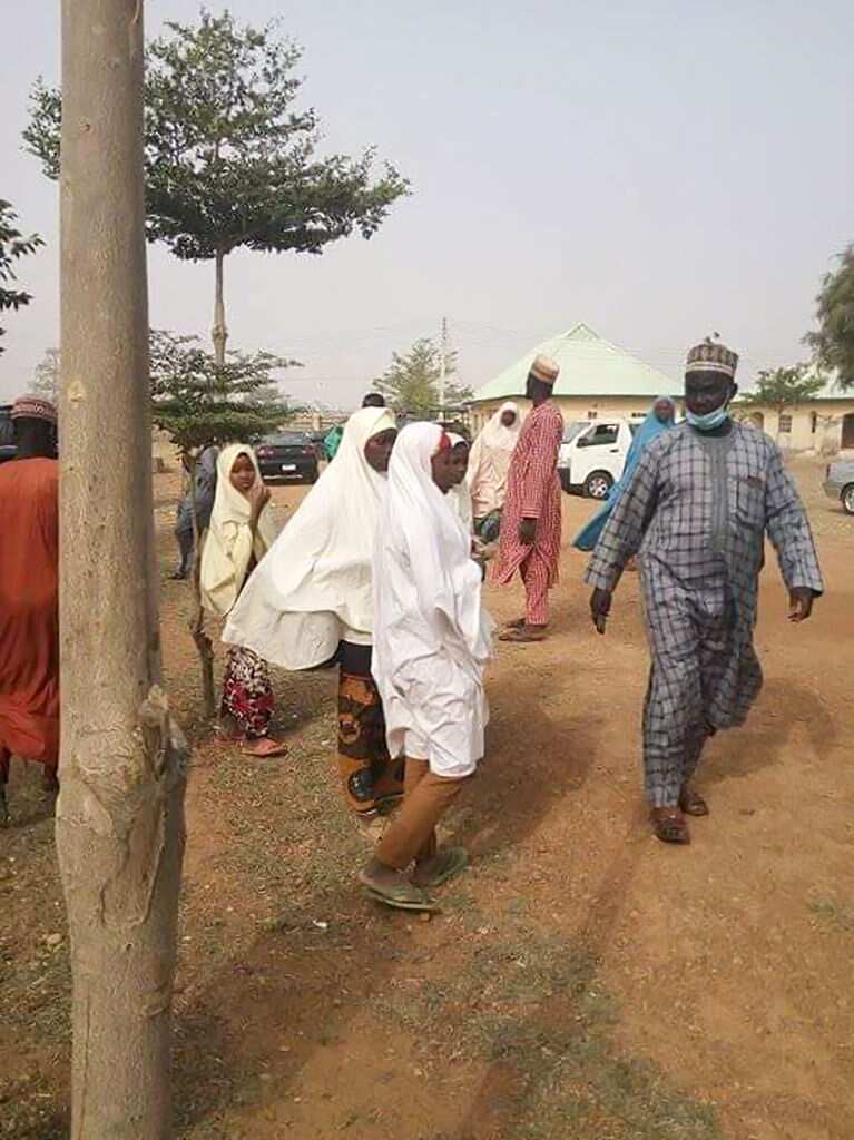 Parents arrive at the school compound in search of children kidnapped by bandits, in Jangede, Zamfara State in northwest Nigeria.