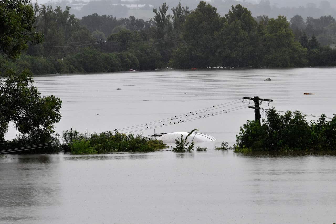 An inundated barn is seen in floodwaters in Richmond, NSW, on 22 March.