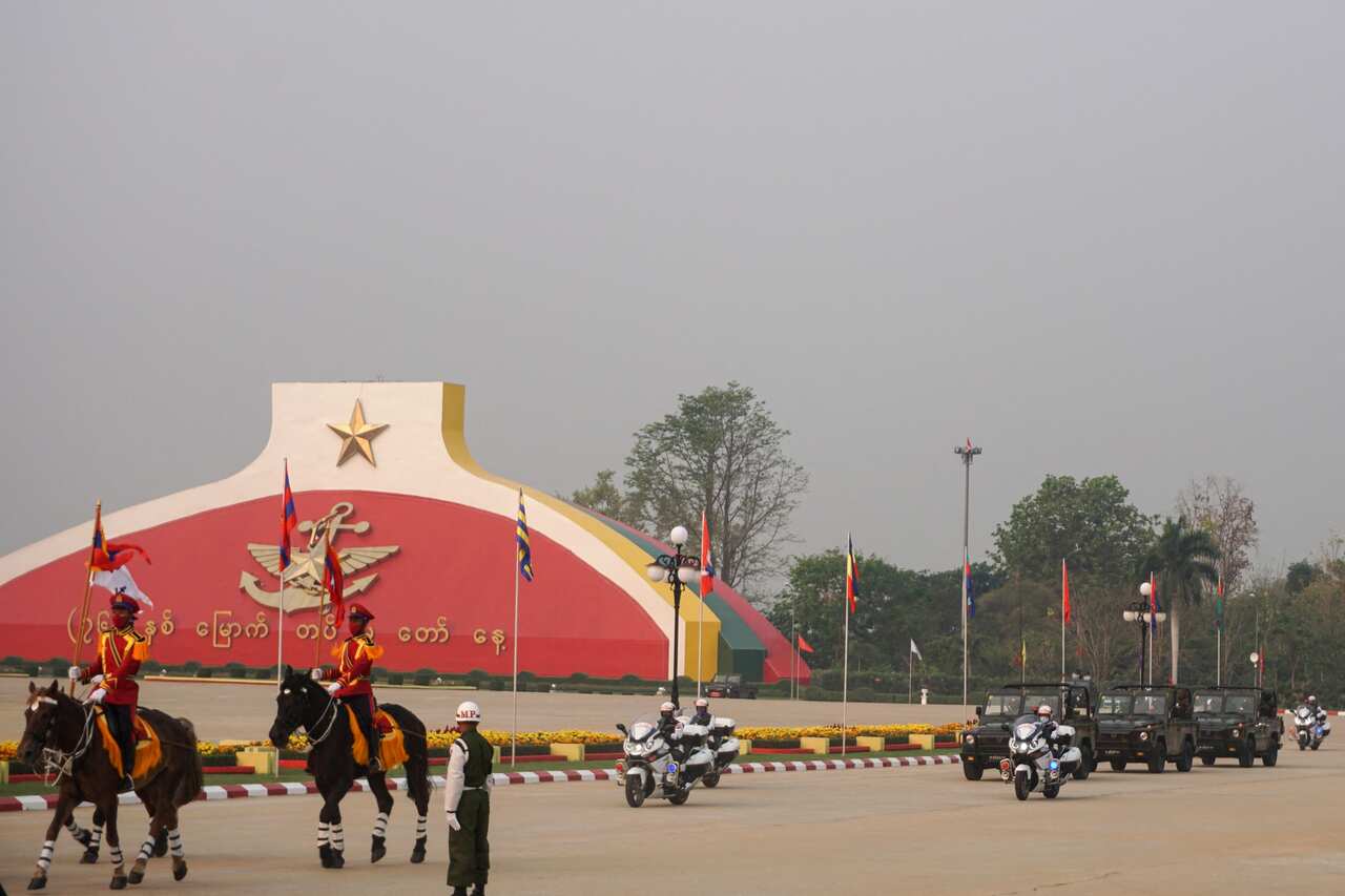 Soldiers on horseback lead the convoy of Myanmar armed forces chief Senior General Min Aung Hlaing as he arrives for the Armed Forces Day parade.