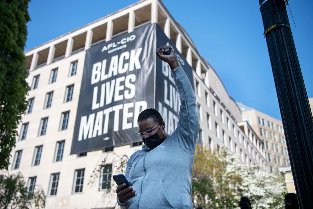 A person reacts to the guilty verdict against former Minneapolis police officer Derek Chauvin at Black Lives Matter Plaza in Washington.
