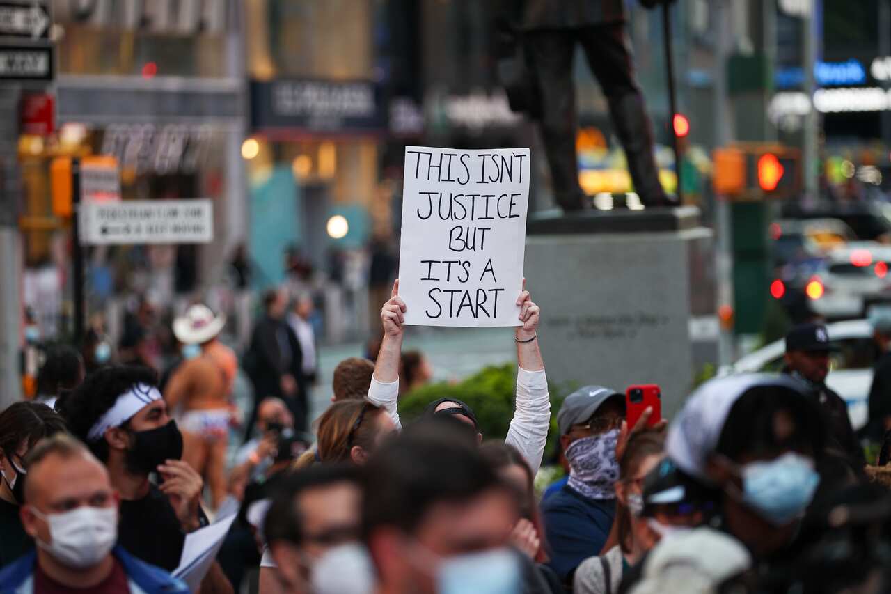 People gather at Times Square after Derek Chauvin verdict