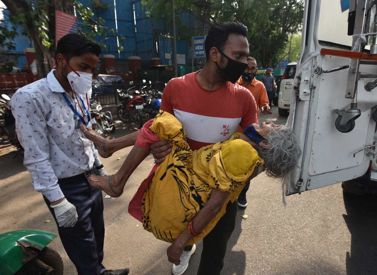 As COVID Cases Surge, Indian Hospitals Struggle With Shortage Of Beds