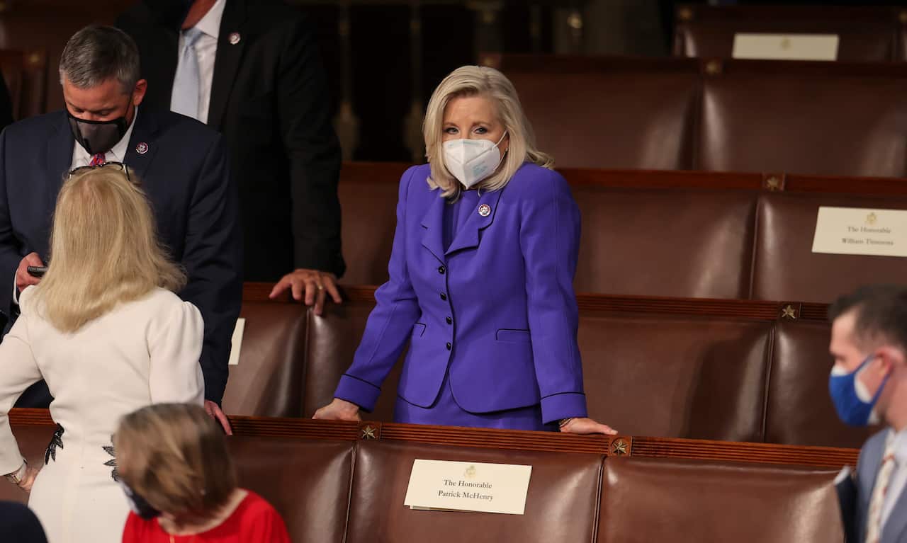 Liz Cheney waits for US President Joe Biden to deliver his first address to a joint session of the US Congress in the House chamber on 28 April, 2021.