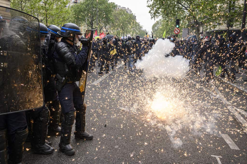 Protesters clashes with police at May Day demonstration in Paris, France.