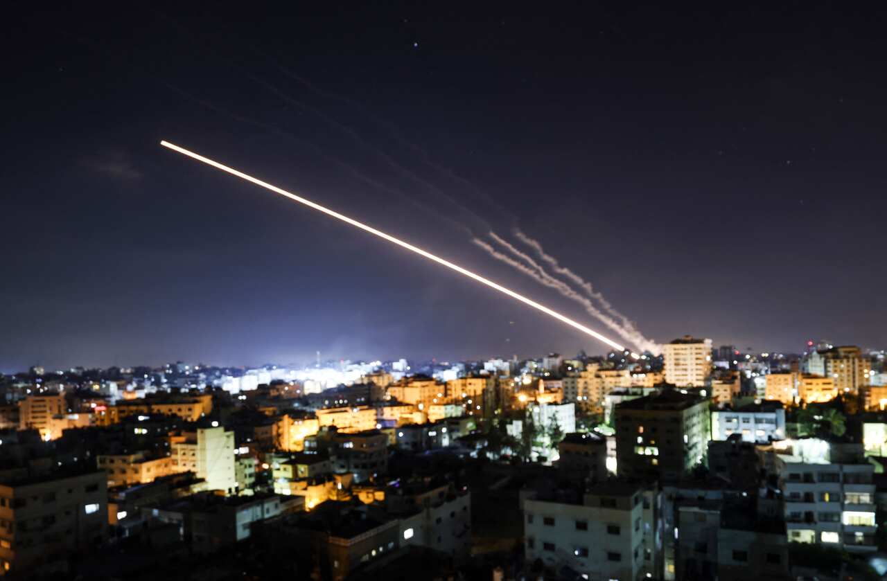 Rockets are launched from Gaza City towards Israel early on 15 May, 2021.