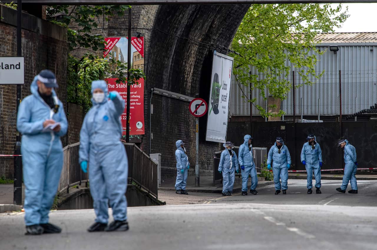 Police forensic officers on Consort Road as they investigate the shooting of Sasha Johnson on May 24, 2021 in London, England.