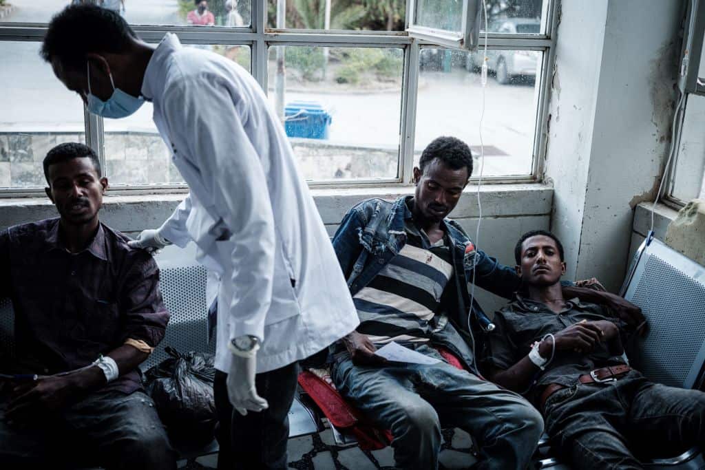 Injured residents of Togoga, a village about 20km west of Mekele, wait at the Ayder referral hospital in Mekele, Ethiopia, on 23 June, 2021.