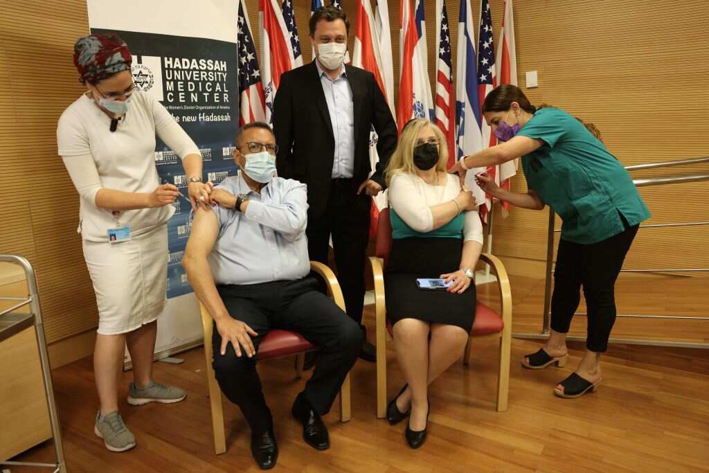 Mayor of Jerusalem Moshe Leon and his wife Stavit receive a third booster jab