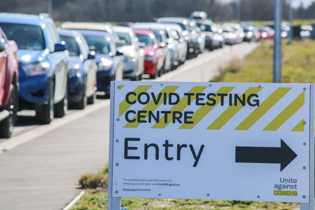 Vehicles queue for a testing site in Christchurch
