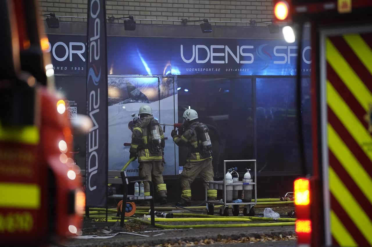 Firemen work at the site of an explosion in central Gothenburg on September 28, 2021.