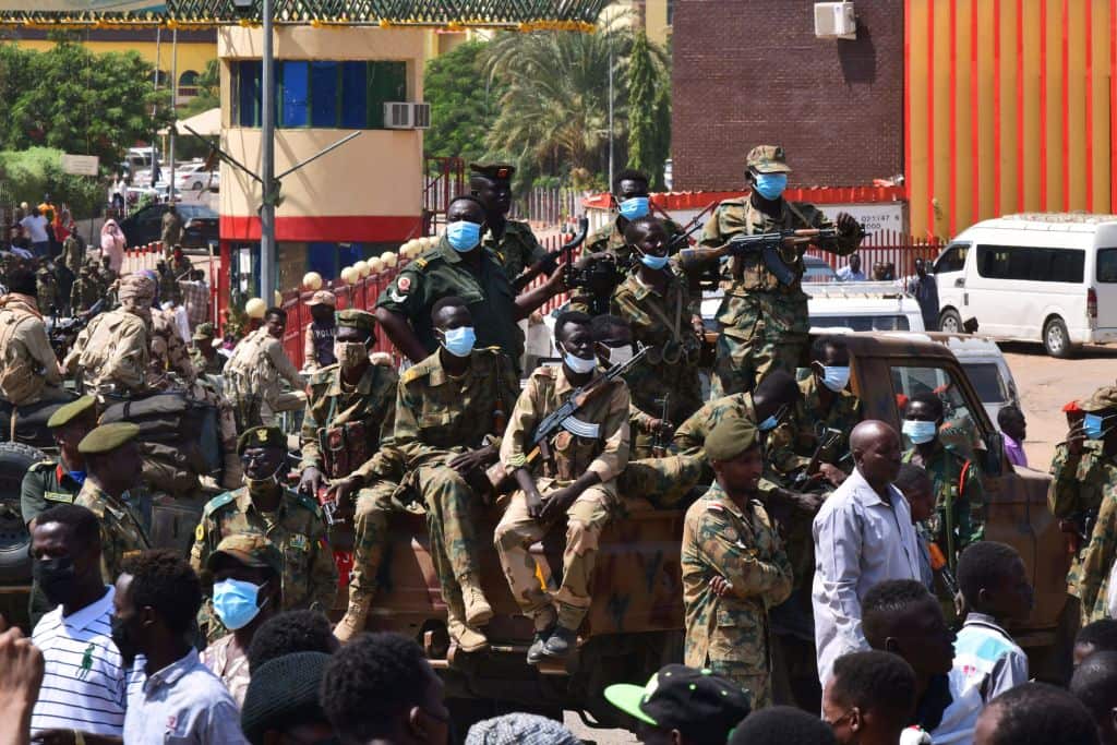 Sudanese security forces keep watch during protests against a military coup on 25 October, 2021 in the capital's twin city of Omdurman. 