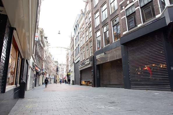 ping street in Amsterdam, the Netherlands. The new lockdown in the Netherlands took effect from Dec. 19, 2021 and will remain in effect until Jan. 14, 2022. (Photo by Sylvia Lederer/Xinhua via Getty Images)