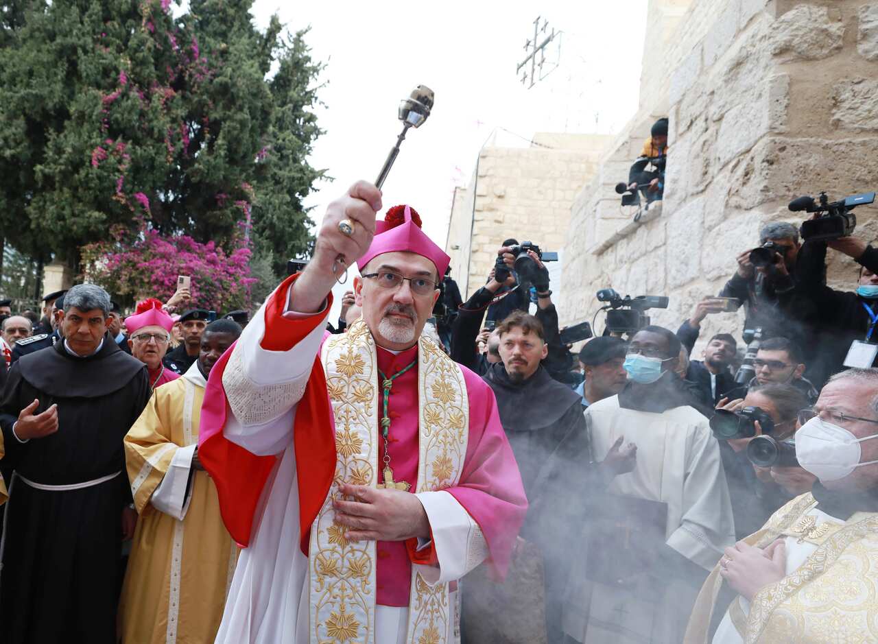 Latin Patriarch of Jerusalem Archbishop Pierbattista Pizzaballa arrives for mass to be held at Church of the Nativity, where Jesus is believed to have been born in in Bethlehem, West Bank on December 24, 2021