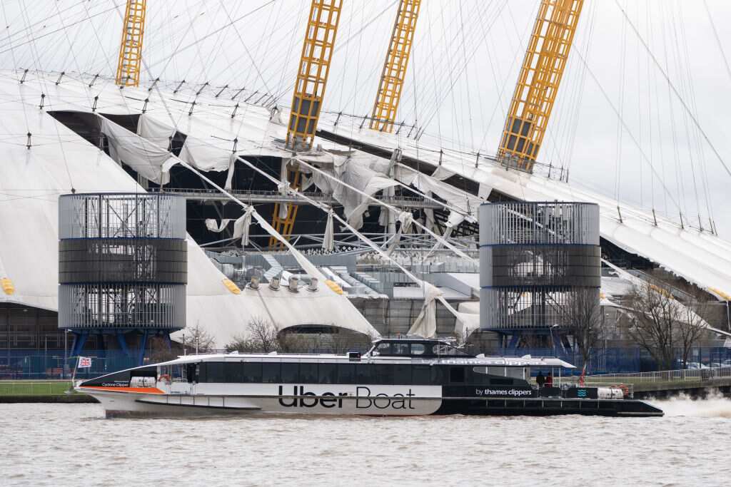 The O2 Arena in London, with part of its roof ripped off after Storm Eunice struck.