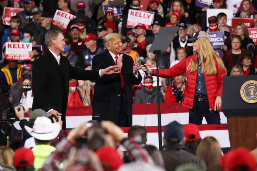 President Donald Trump attends a rally in support of Senators David Perdue and Kelly Loeffler on 5 December in Valdosta, Georgia.