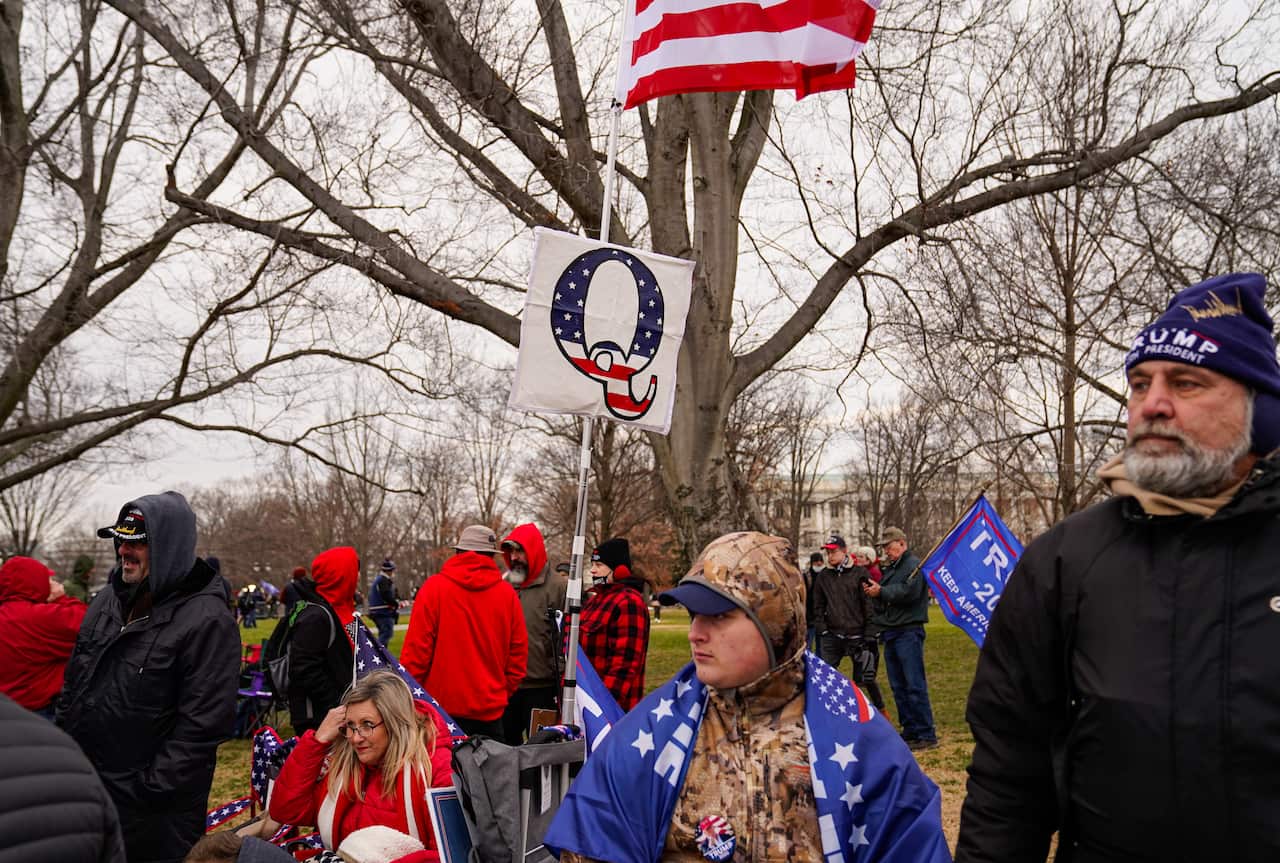 A QAnon symbol is seen during the US Capitol riot.