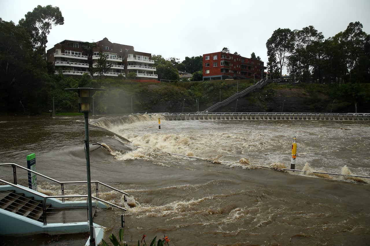Parramatta ferry wharf overflows and floods due to continuous and heavy rain on Saturday, 20 March.