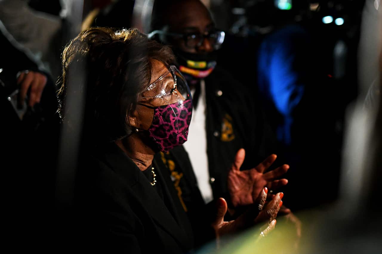 Representative Maxine Waters joins demonstrators in a protest outside the Brooklyn Center police station on 17 April, 2021 in Minnesota. 