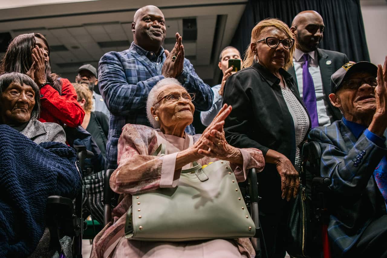 Survivors Lessie Benningfield Randle, Viola Fletcher, and Hughes Van Ellis sing together at commemorations of the 100th anniversary of the Tulsa Race Massacre.