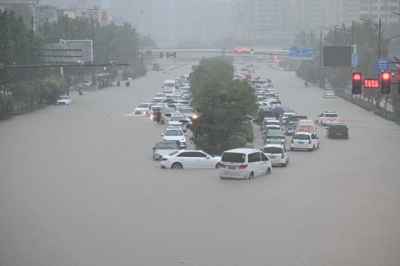 Vehicles are stranded in floodwater near Zhengzhou Railway Station on 20 July, 2021 in Zhengzhou, Henan Province of China.