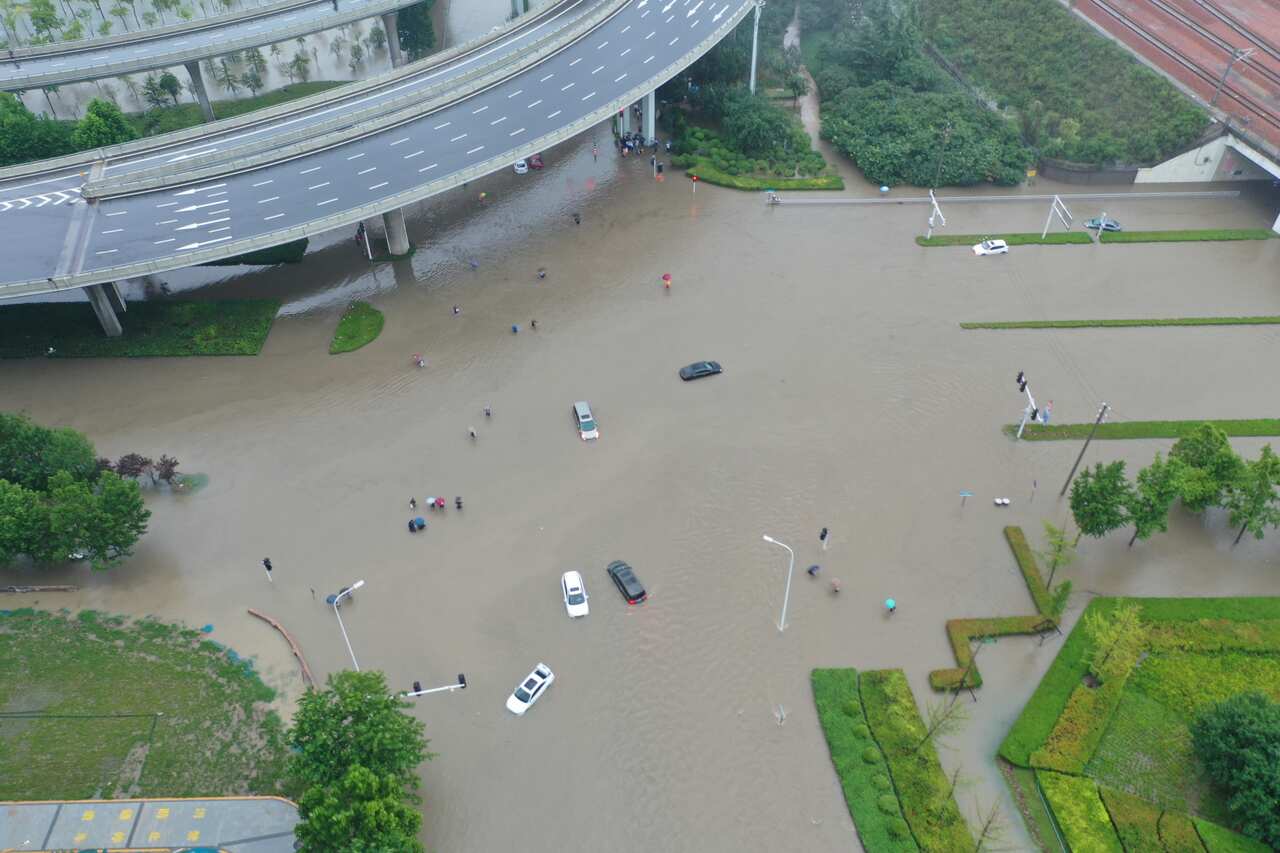 Vehicles are shown stranded in floodwater on 20 July, 2021 in Zhengzhou, Henan Province of China.