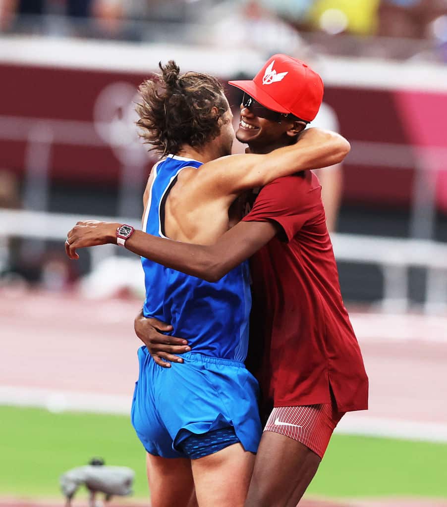 Gianmarco Tamberi of Italy celebrates sharing the gold medal with Muta Essa Barshim of Qatar in the High Jump on day nine of the Tokyo 2020 Olympic Games. 