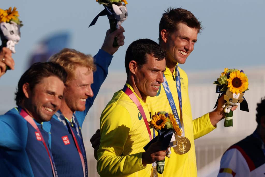 Mathew Belcher and Will Ryan of Team Australia with their gold medals for winning the Men's 470 class at Enoshima Yacht Harbour, 4 August, 2021. 