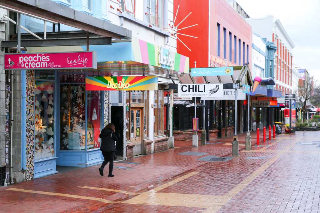 A pedestrian walks down Cuba Mall during the first day of a national lockdown on 18 August, 2021 in Wellington, New Zealand. 