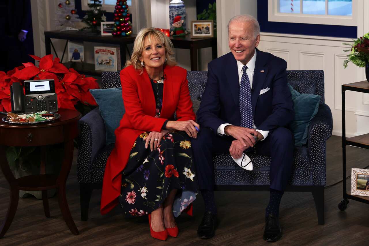 President Joe Biden and first lady Dr. Jill Biden participate in an event to call NORAD and track the path of Santa Claus on Christmas Eve,