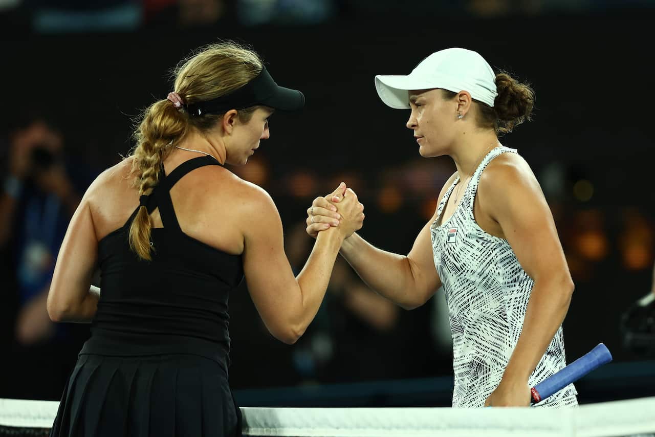 Ash Barty shakes hands with Danielle Collins of United States after winning the Australian Open title.