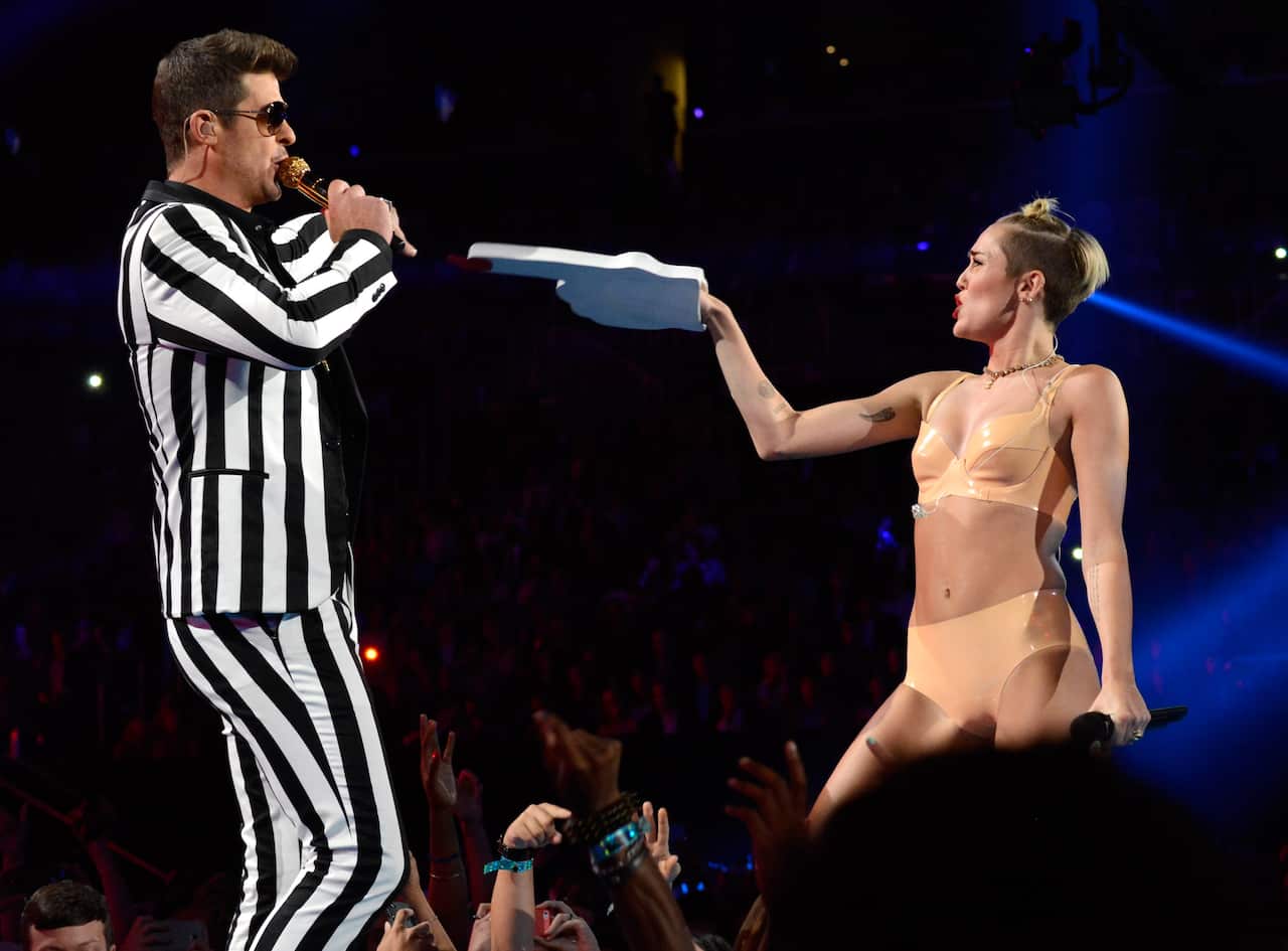 Cyrus and Robin Thicke perform a medley of "We Can't Stop" and "Blurred Lines" at the 2013 VMA's. Thicke was similarly accused of plagiarizing Marvin Gaye.  