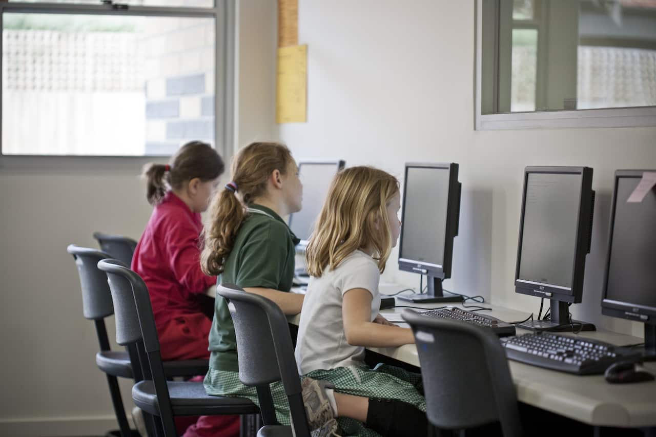 School children in classroom.