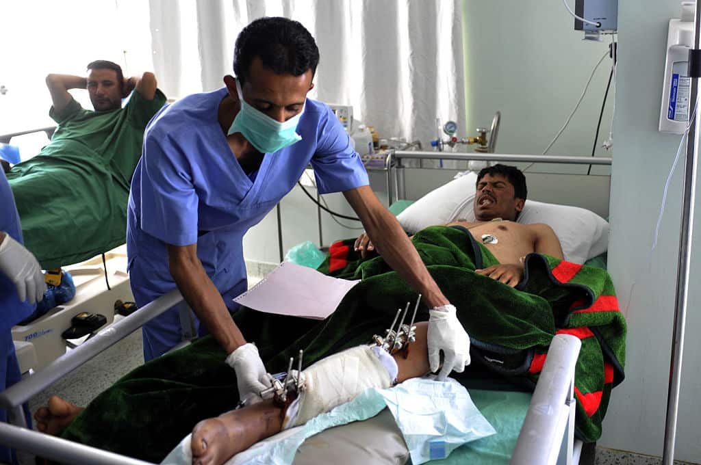 A wounded man is treated at a hospital