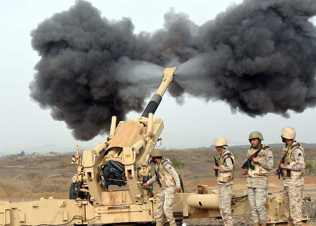 Saudi army artillery fire shells towards Yemen from a post close to the Saudi-Yemeni border.