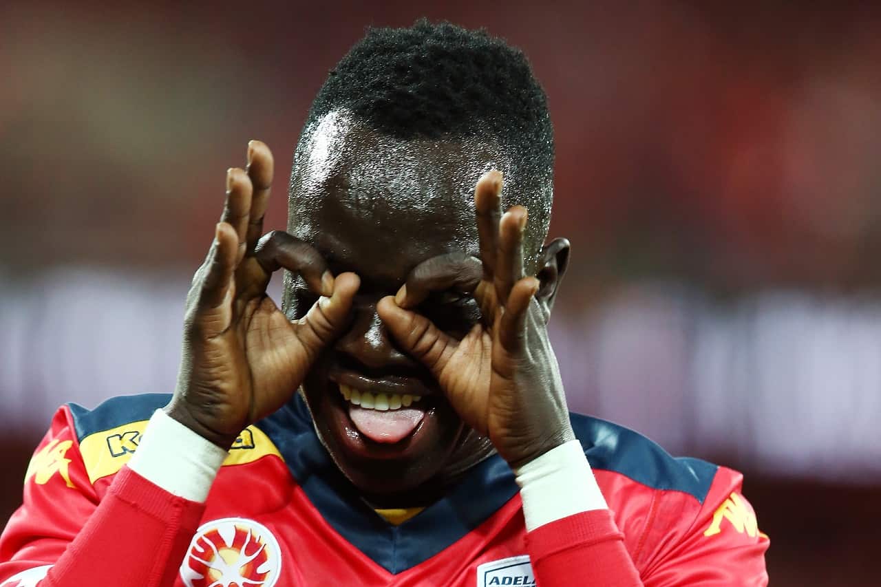 Awer Mabil celebrates after scoring a goal during the A-League Elimination Final match between Adelaide United and Brisbane Roar.
