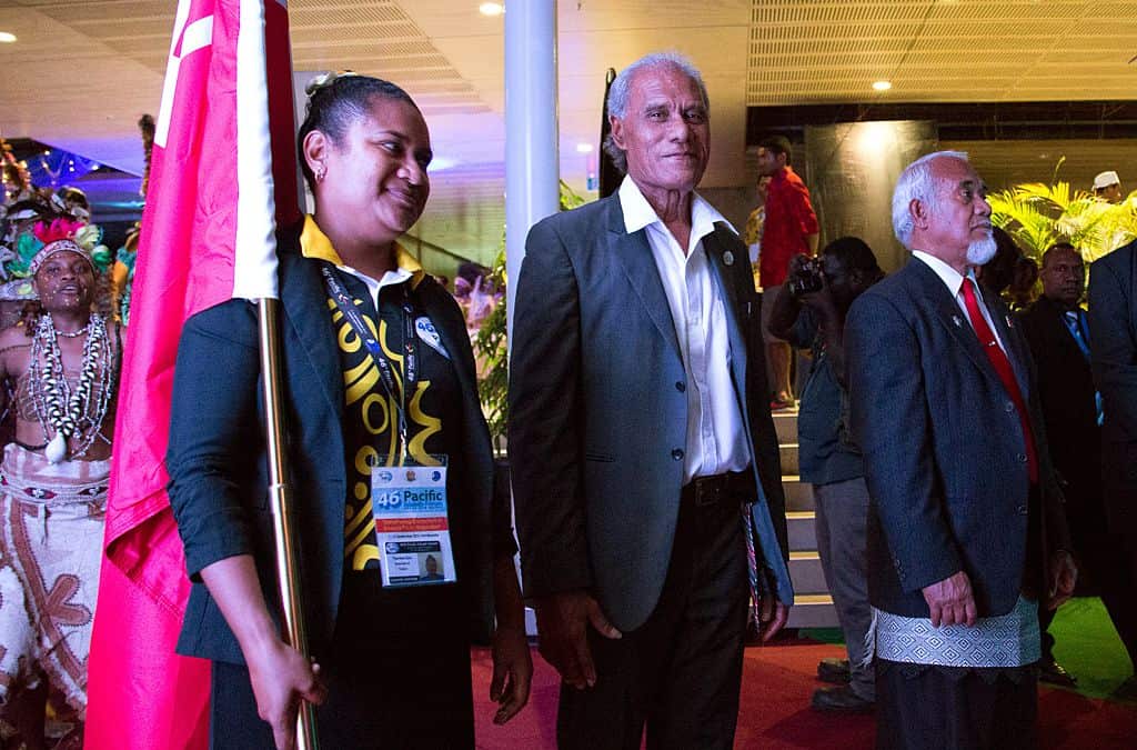 Tonga's Prime Minister 'Akilisi Pohiva (C)  arrives for the 46th Pacific Islands Forum in 2015.