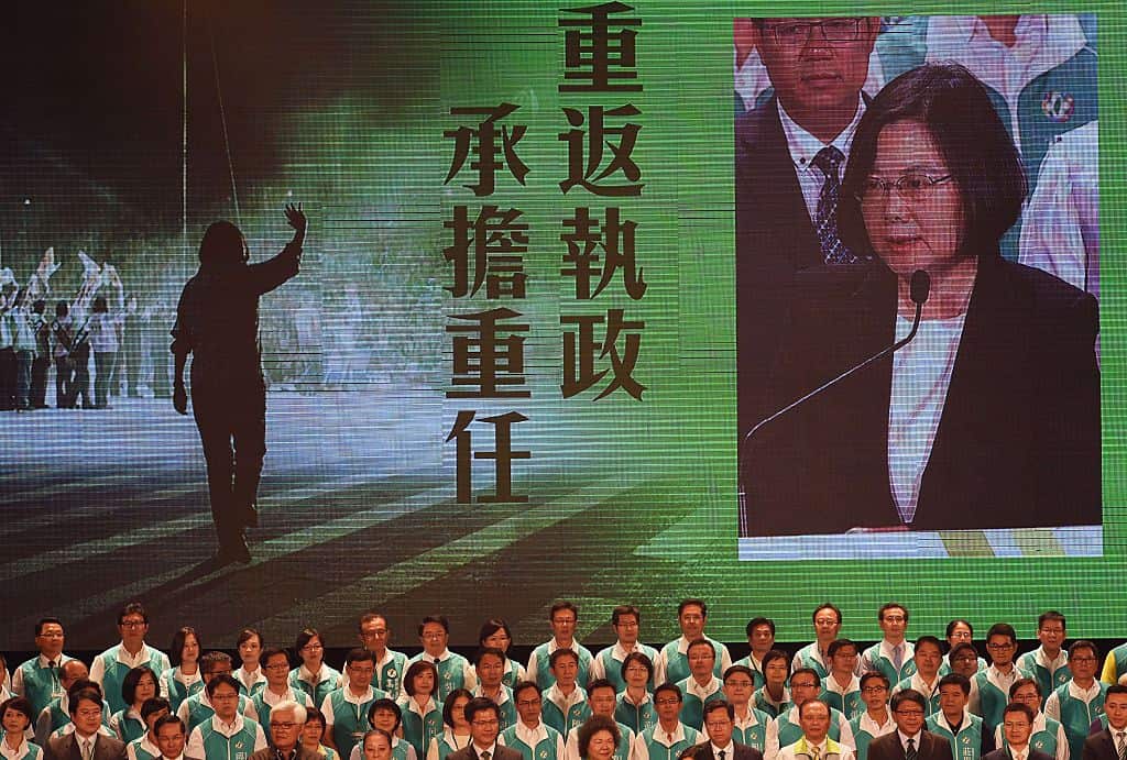 Chairwoman of Taiwan's main opposition Democratic Progressive Party (DPP) Tsai Ing-wen (upper R on screen) speaks during the party congress in Taoyuan, northern Taiwan
