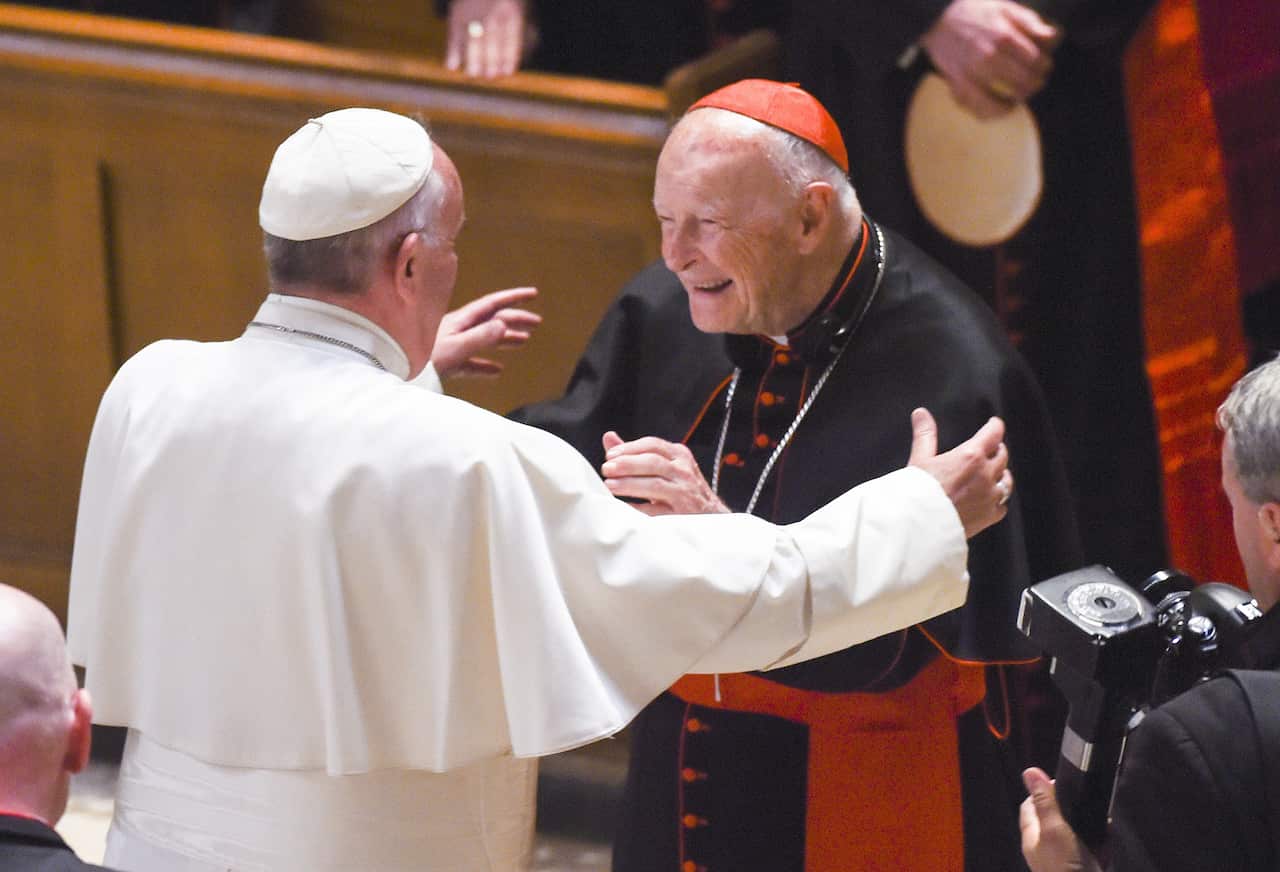 Cardinal Archbishop emeritus Theodore McCarrick greets Pope Francis at the Cathedral of St. Matthew the Apostle on 23 September, 2015 in Washington, DC. 