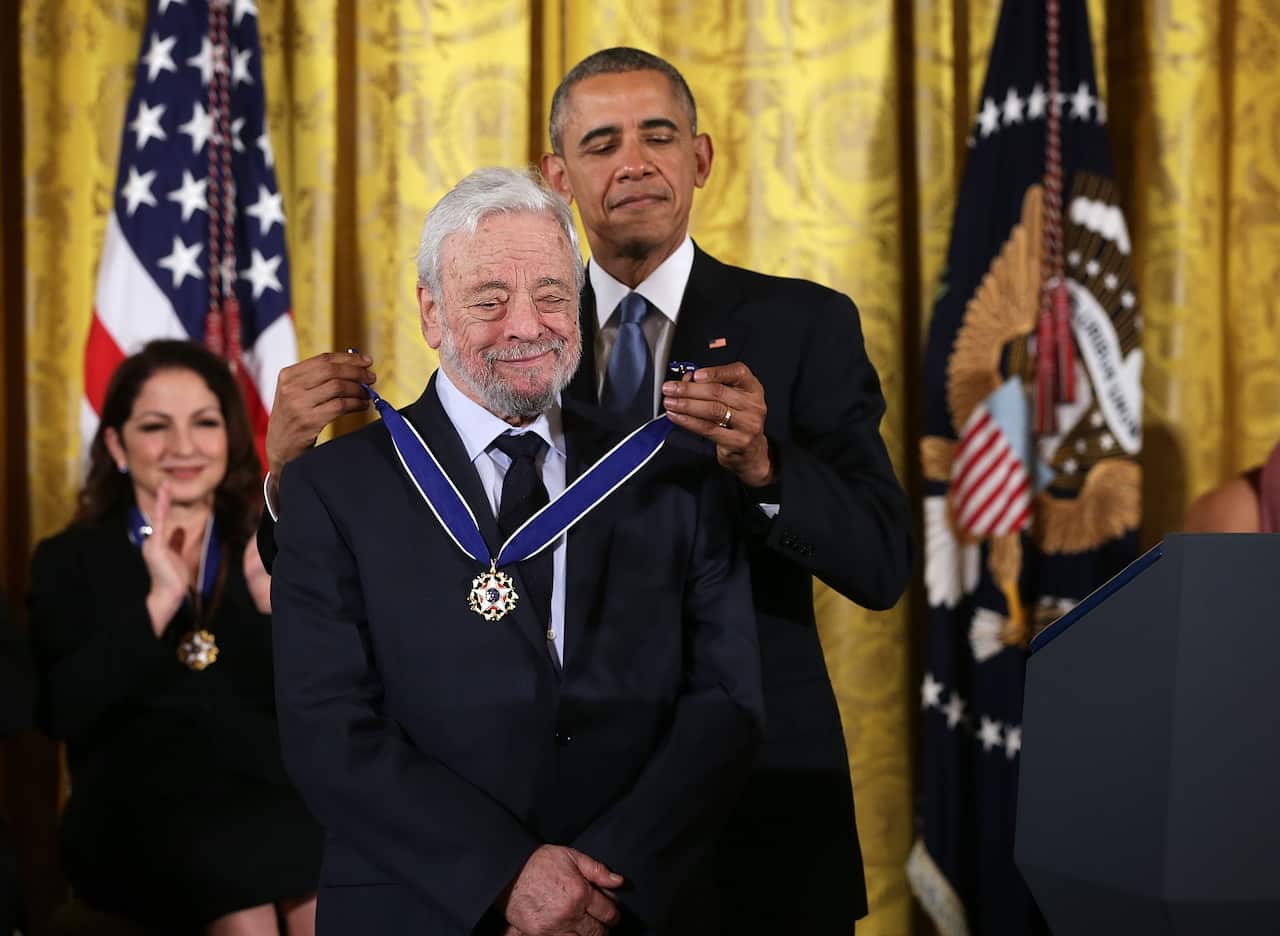 .S. President Barack Obama (R) presents the Presidential Medal of Freedom to theater composers and lyricists Stephen Sondheim
