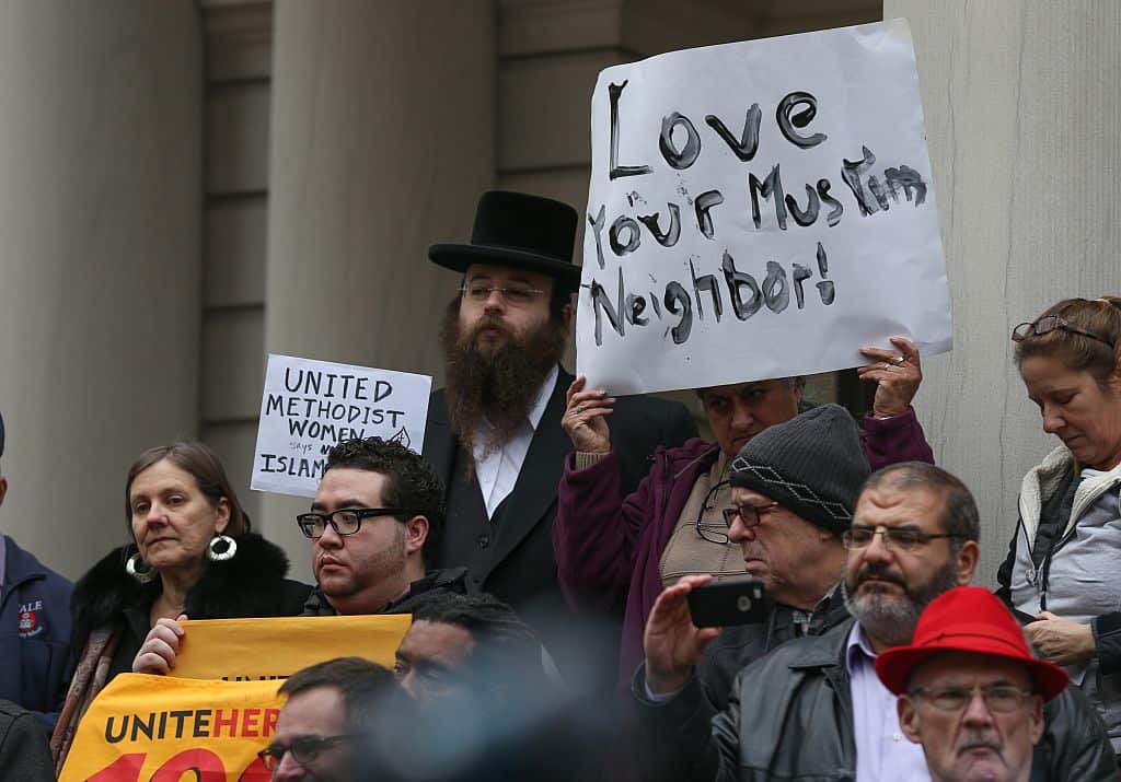 Religious leaders protest against Donald Trump's anti-Muslim hate speech in front of the New York City Hall December 2015.