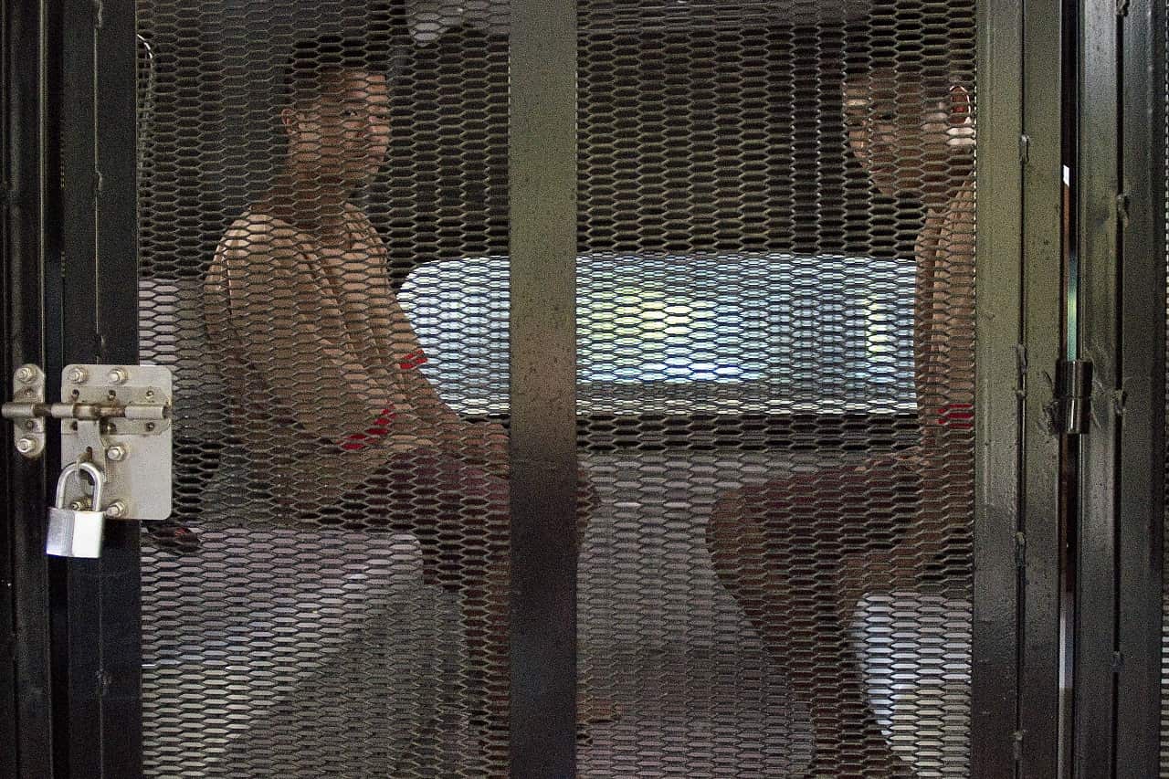 Myanmar citizens U Zaw Lin, left, and U Win Zaw Htun, leaving the Koh Samui provincial court after being sentenced to death in 2015.