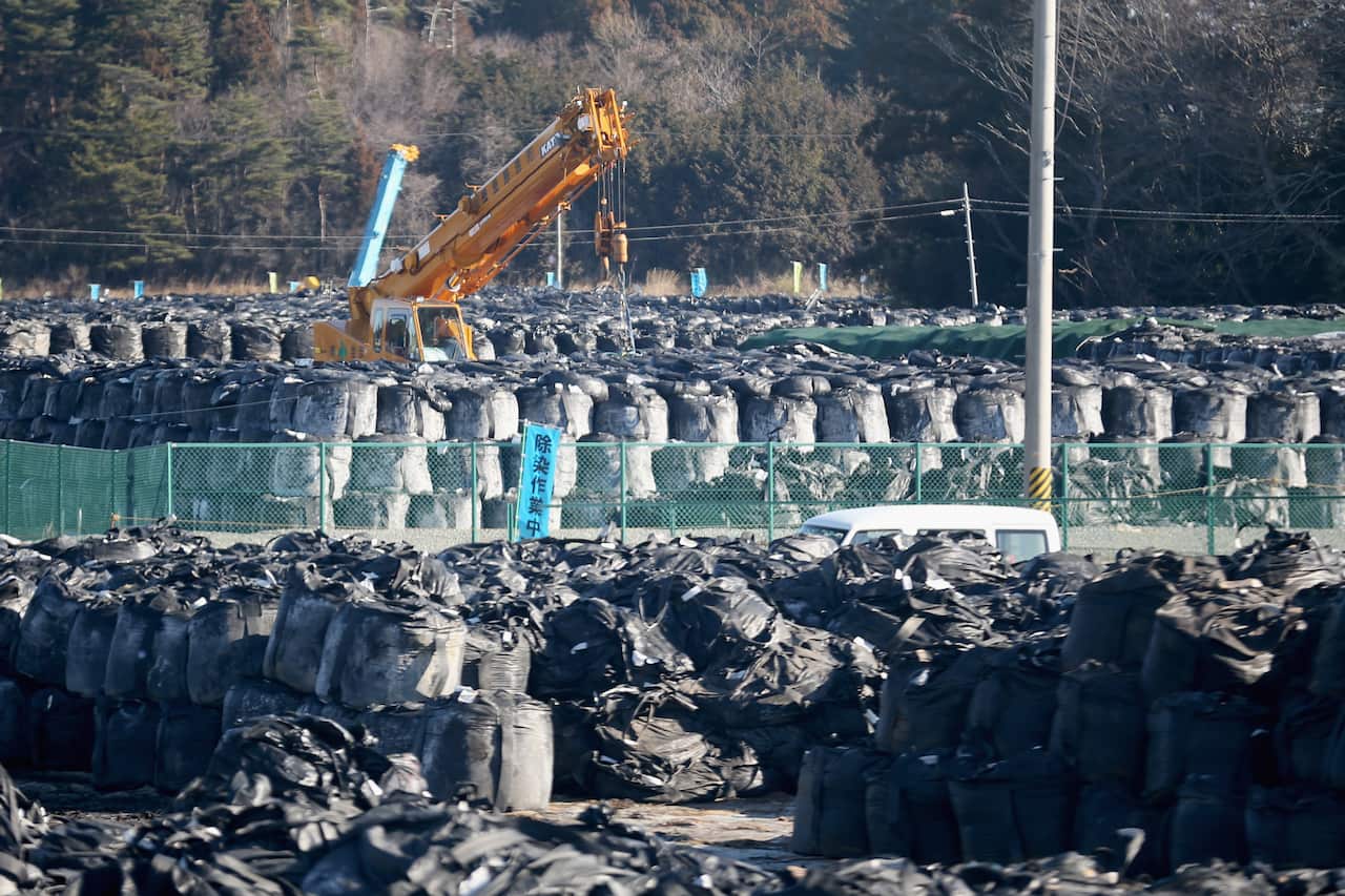 Workers continue the decontamination and reconstruction process at Tokyo Electric Power Co.'s Fukushima Daiichi nuclear power plant.
