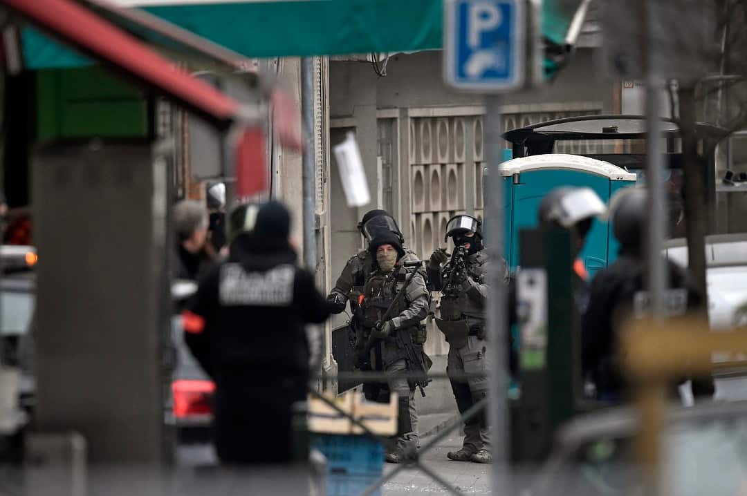 Four police officers were wounded and a fellow jihadist was killed in the shootout.